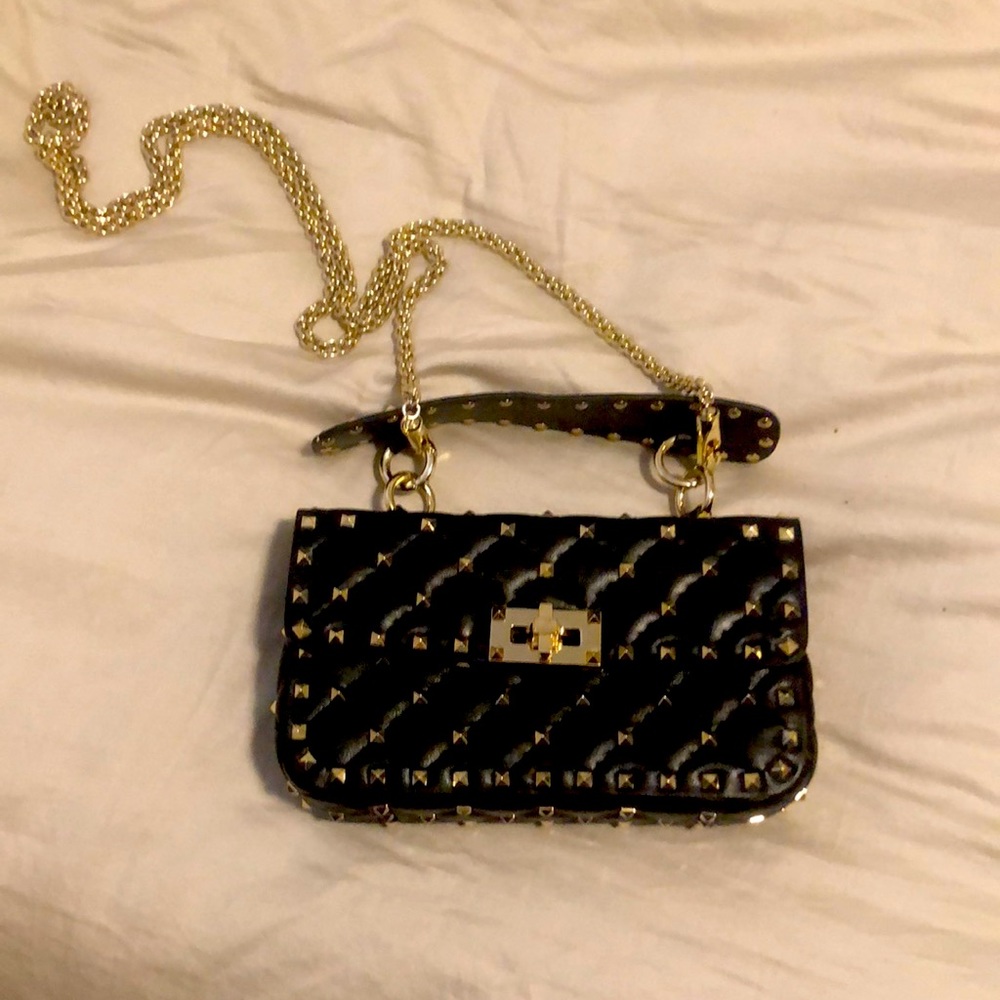 Incredibly authentic looking real leather rockstud Valentino faux bag.